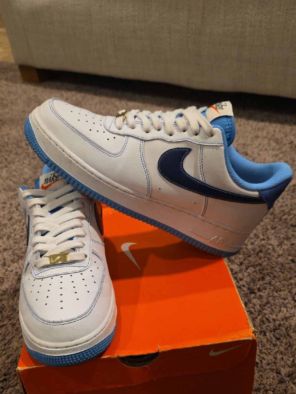 Nike Air Force 1 White Sneakers with Light Blue and Navy Swoosh